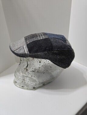 Hanna Hats patchwork touring cap features a blue and grey   Burgundy Lining